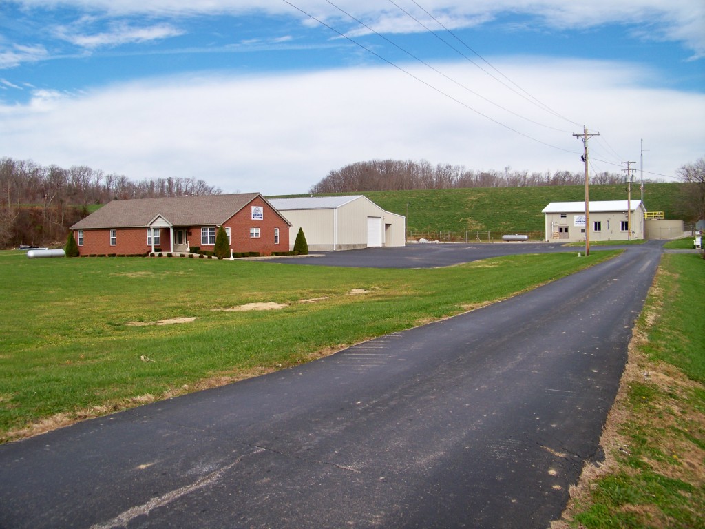 Road with red house 